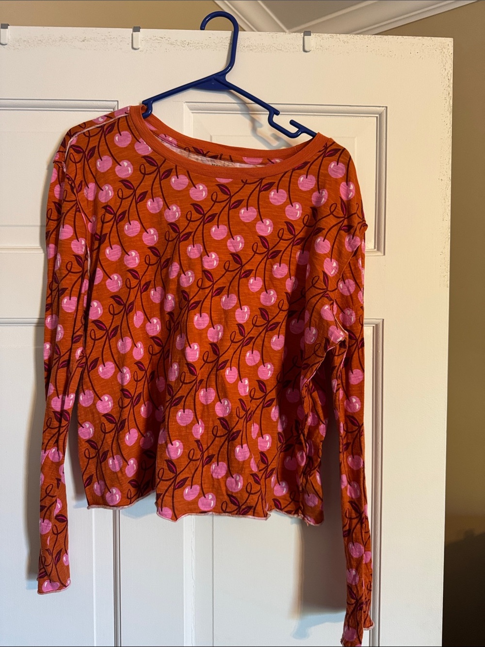Anthropologie Orange Long-Sleeve Top with Pink Cherry Print